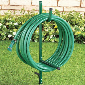 Green garden watering pipe