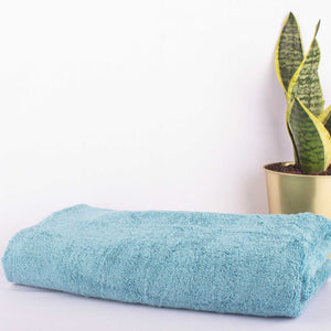 blue bath towel for bathroom