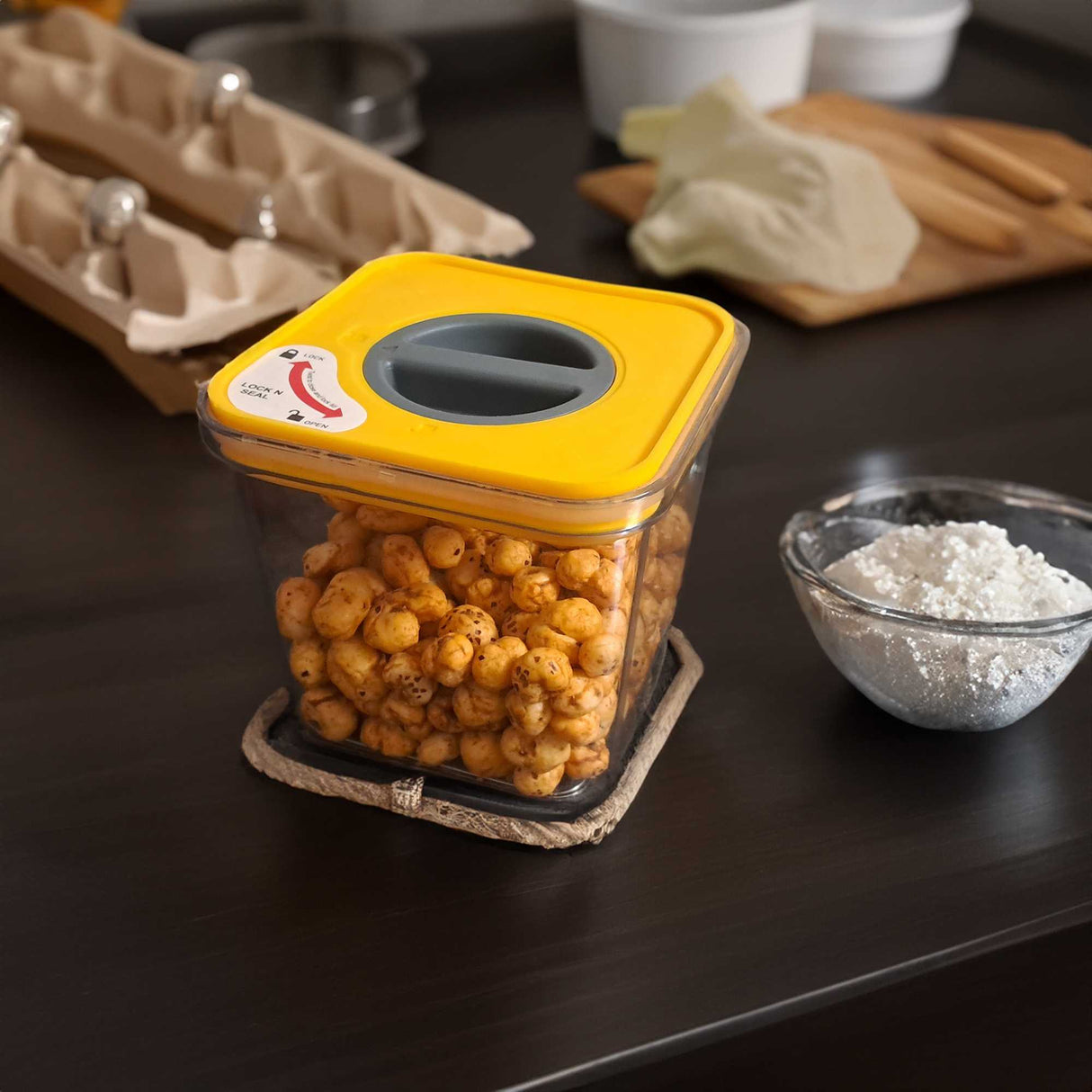 Plastic storage box with vacuum lid and makhana