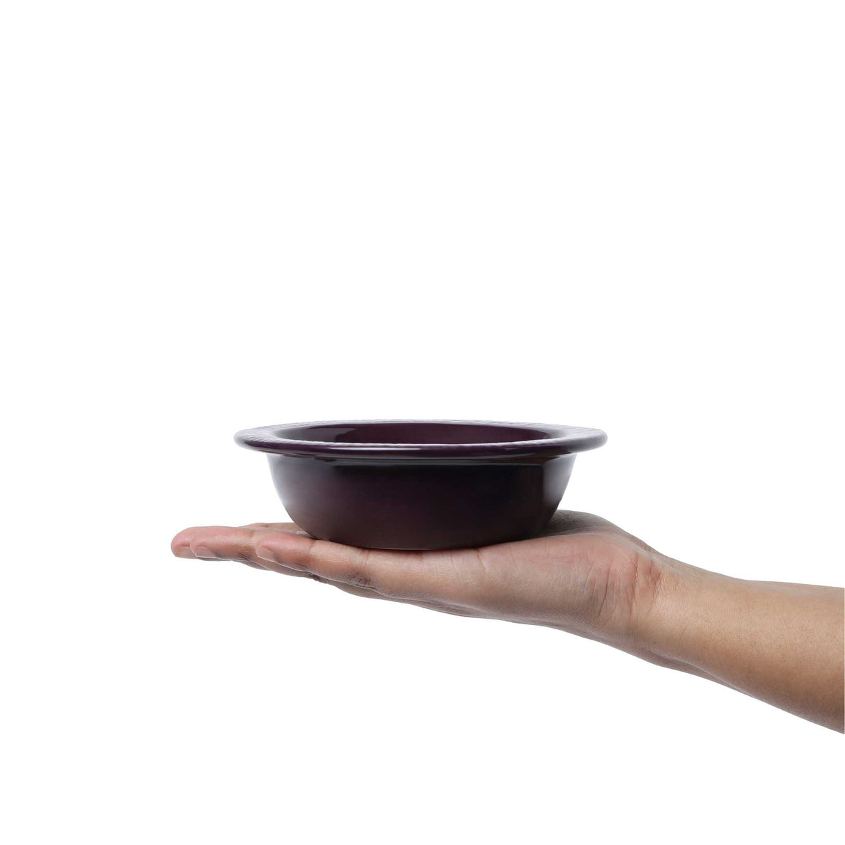 Ceramic bowl in hand