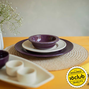 Purple and white ceramic bowl and plates