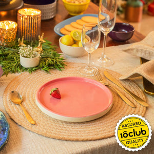 Pink ceramic plate in table setting