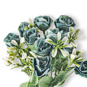 Blue roses with ferns