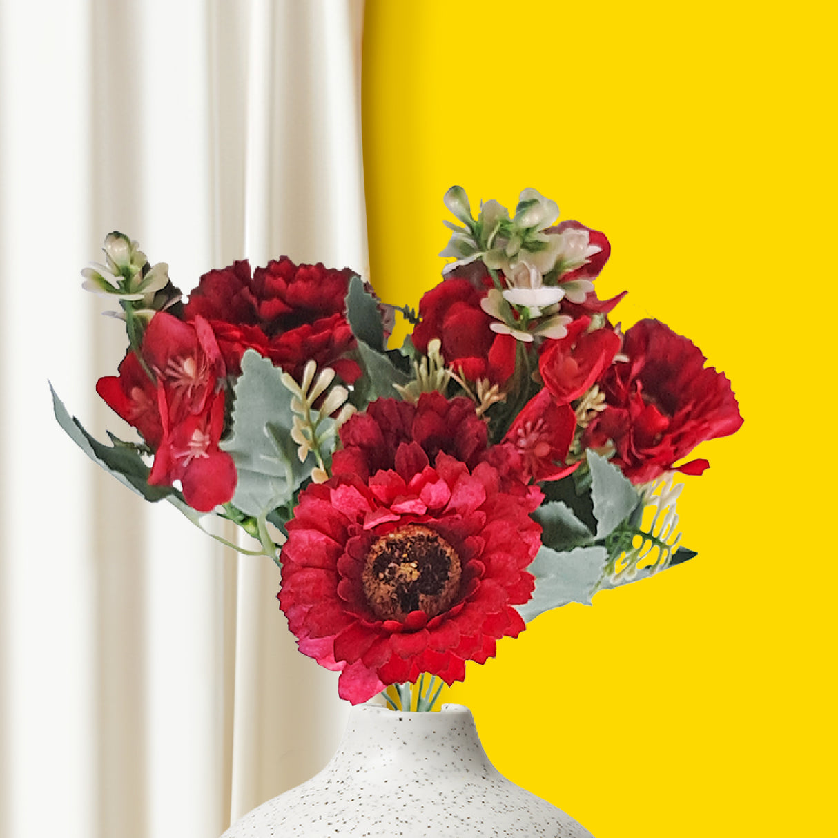 Red gerberas and fern artificial flowers for home 