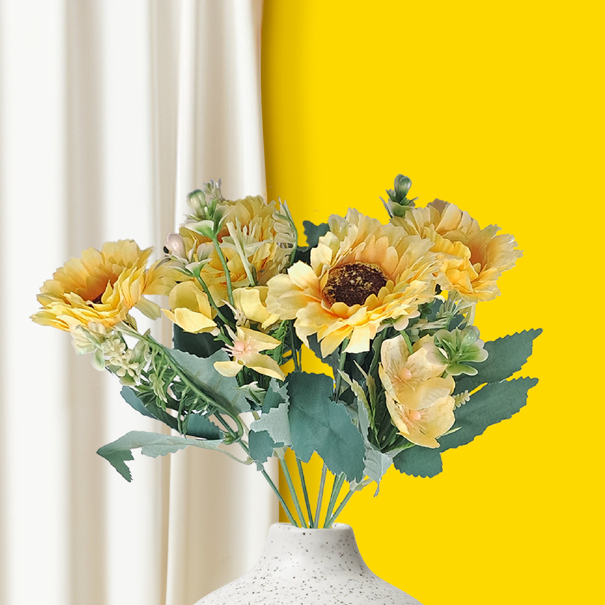 Vibrant yellow gerberas and fern artificial flowers 