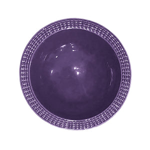 Purple ceramic bowl with dotted edge design