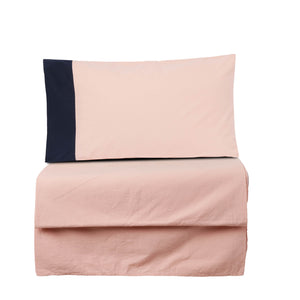 Peach bedsheet with pillow covers