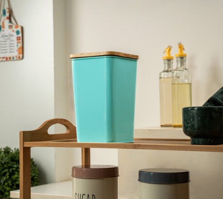 Blue storage jar with wooden lid