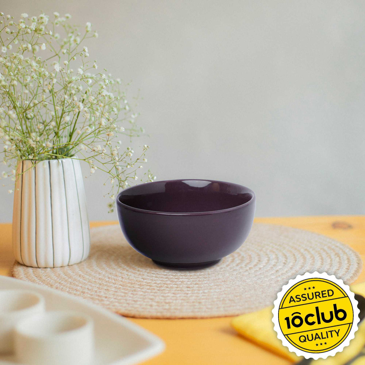 Solid purple ceramic bowl