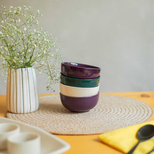 Bowls in green purple and white