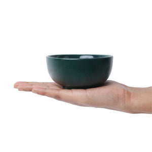 Green simple bowl in hand