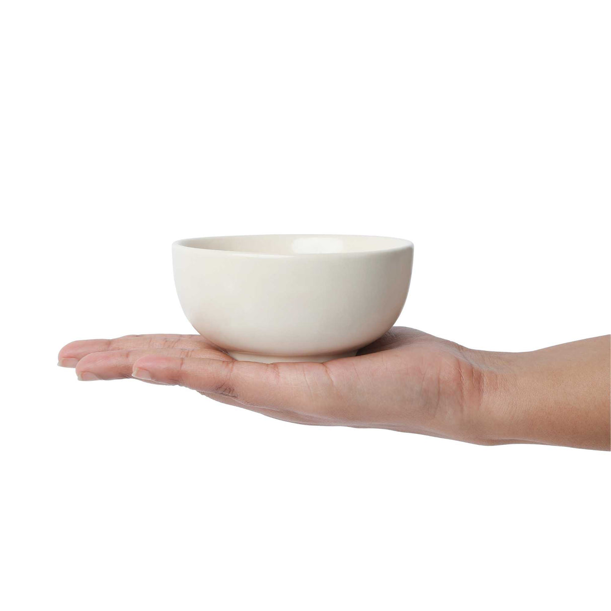 White bowl in hand