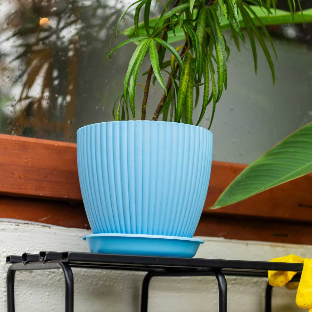 Blue fluted plastic pot for home